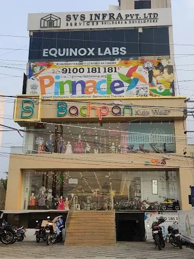 Building and Pinnacle signage at Chanda Nagar.