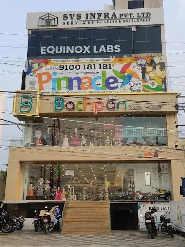 Building and Pinnacle signage at Chanda Nagar.