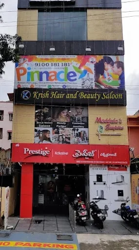 Building and Pinnacle signage at Guntur.
