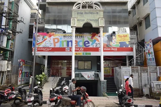 Building and Pinnacle signage at Indira Nagar.