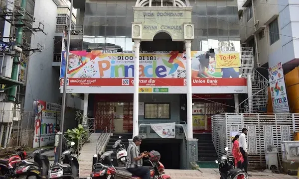 Building and Pinnacle signage at Indira Nagar.