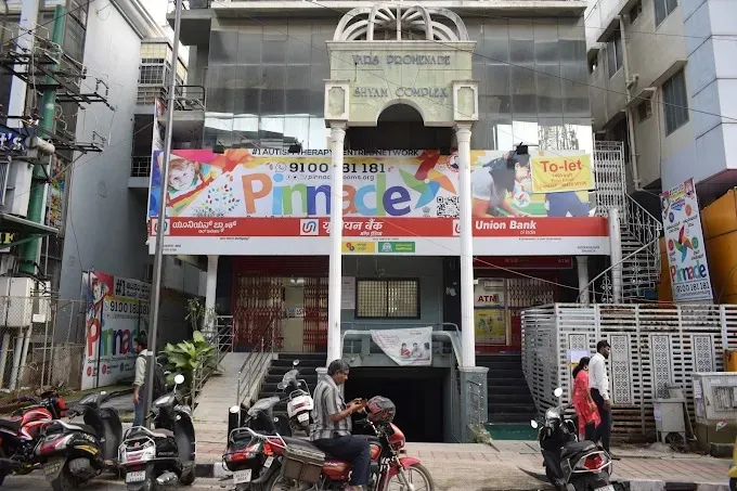 Building and Pinnacle signage at Indira Nagar.