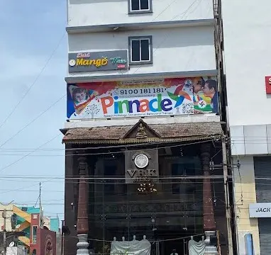 Building and Pinnacle signage at Nizamabad.