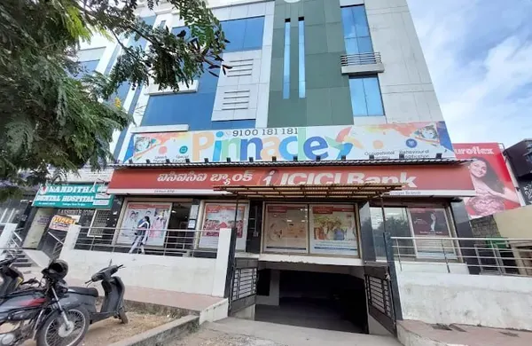 Building and Pinnacle signage at SR Nagar.